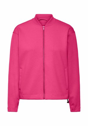 Rosa Zip-Jacke aus weichem Stoff. Merkmale einen gerippten Kragen und Bündchen, zwei seitliche Taschen und ein gerades Schnittdesign. Glatte Textur.