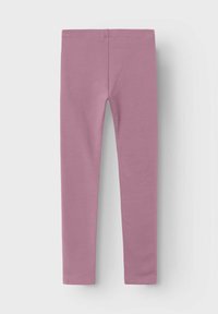 Leggings en coton rose avec une texture lisse, un design ajusté et une taille élastique. Ils présentent une couleur unie sans motifs ni accents visibles.