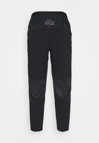 Pantalon de sport noir Nike Running Division avec panneaux en mesh à l'arrière des genoux et poche zippée à la taille.