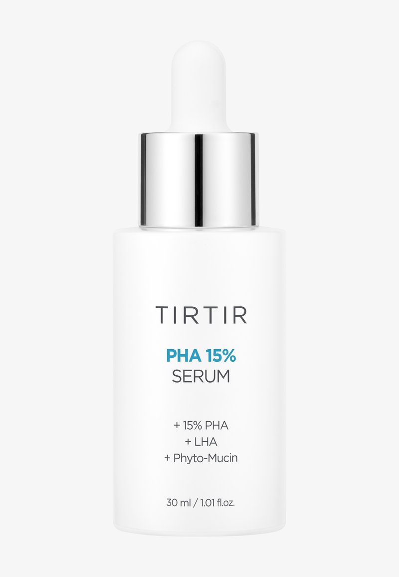 Suero TIRTIR PHA al 15% en una botella blanca esmerilada con un tapón gotero plateado. El texto incluye ingredientes y volumen (30 ml/1.01 fl. oz).