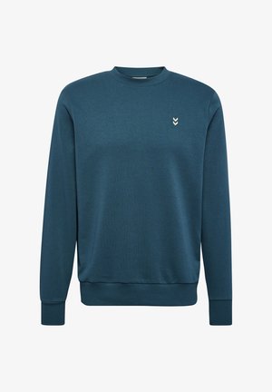 Teal sweatshirt with long sleeves, round neckline, ribbed cuffs and hem. Features a small, white chevron logo on the chest. Soft texture.
