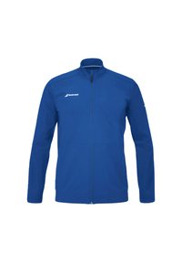Blå fuld-zip sportsjakke med høj krave, lange ærmer og hvid Babolat-logo på venstre bryst og højre ærme.