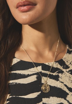 Next, THE KINGS TRUST X CHANGE A GIRLS LIFE CAMPAIGN HAMMERED DISC NECKLACE  . - Necklace - gold tone