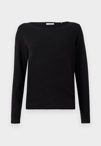 Svart långärmad t-shirt i mjuk bomull. Rundad halsringning och rak passform med minimala sömnadsdetaljer, med en subtil etikett.