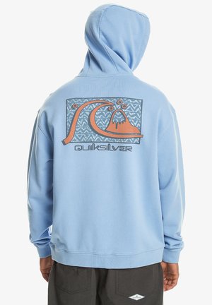 Light blue sweatshirt with a hood, featuring a graphic design on the back that includes a wave and mountain, labeled "Quiksilver."