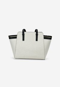 Bolso tote de lienzo beige con forma estructurada, asas de cuero negro y acentos de cremallera; presenta una superficie texturizada y un diseño minimalista.