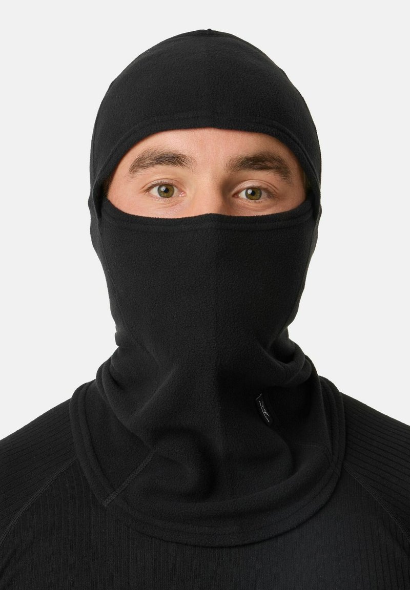 Zwarte fleece balaclava die het hoofd en de nek bedekt. Heeft een soepele textuur, een strakke pasvorm en een laag profielopening voor de ogen.