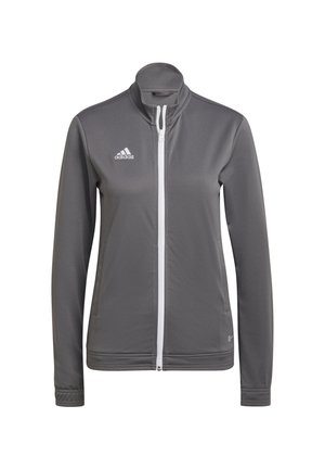 Veste de sport gris Adidas zippée avec une fermeture éclair blanche et un logo sur la poitrine gauche, manches longues et col montant.