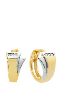 Boucles d'oreilles créoles en or et argent avec un design incurvé et une finition polie. Trois petites pierres claires ornent la partie en or.