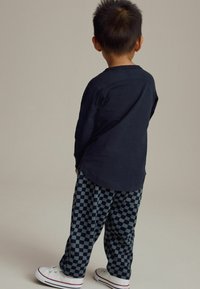 Next REGULAR FIT - PATTERNED  JOGGERS - Jogginghose - navy blue checkerboard