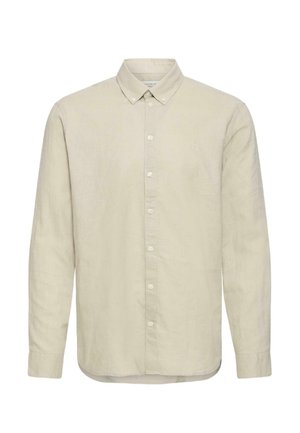 Hellbeiges Leinenhemd mit langen Ärmeln, Knopfleiste, Knopfkragen und dezentem Logodetail auf der Brust.