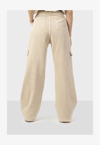 Odabrano, beige