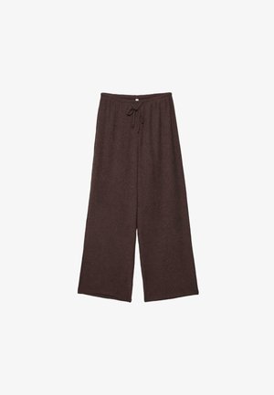 Rjave široke pletene hlače z elastičnim pasom in vrvico za vezanje, predstavljene položene na belo ozadje.