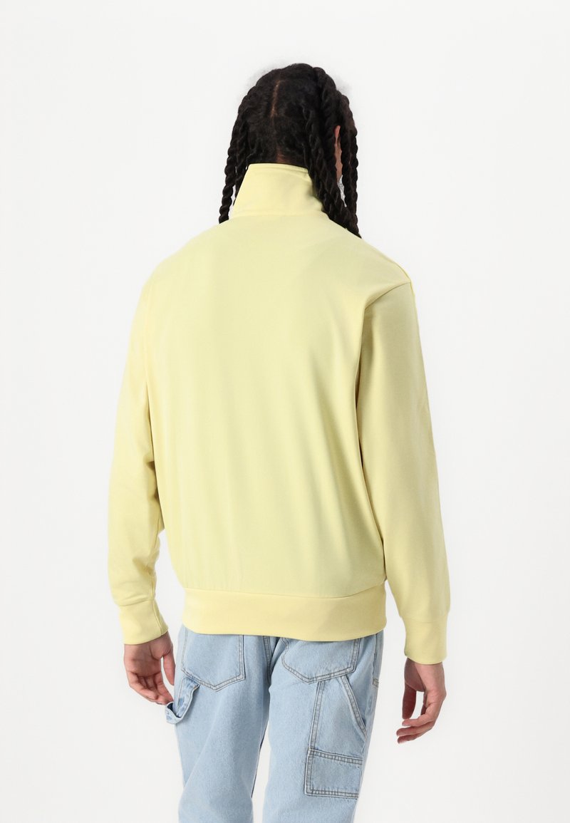 adidas Originals ADICOLOR CLASSICS FIREBIRD - Training jacket - powder  yellow/yellow - Zalando