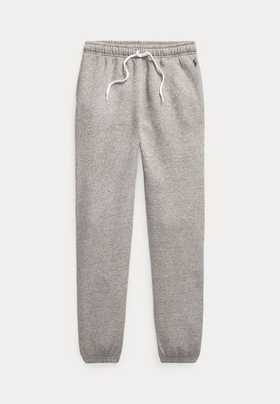 Γκρίζες βαμβακερές φόρμες με ελαστική μέση, λευκό κορδόνι και ριμπ μανσέτες. Διαθέτει ένα μικρό λογότυπο στο πάνω μέρος του μηρού.