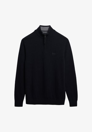 Suéter de punto azul marino con cuello con cremallera, mangas largas y un pequeño logo en el pecho. Tejido texturizado, de peso medio.