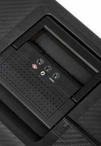 Zwart textuurmateriaal met een compact ontwerp. Bevat een bedieningspaneel met drie ronde knoppen, een sleutelgat en een rode LED-indicator.