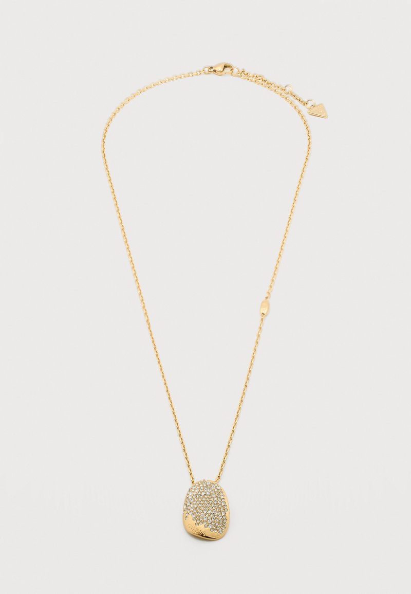 Κολιέ με αλυσίδα χρυσού και ακανόνιστο οβάλ μενταγιόν διακοσμημένο με μικρούς διαυγείς κρυστάλλους, με κούμπωμα και ορατούς ρυθμιζόμενους κρίκους.