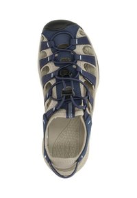 Blue and beige sandal with adjustable straps, textured rubber sole, and protective toe cap. Features open design and cushioned footbed.