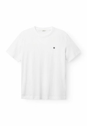 T-shirt bianca a maniche corte con scollo tondo, con un piccolo logo nero sul lato sinistro del petto, visualizzata su uno sfondo bianco uniforme.