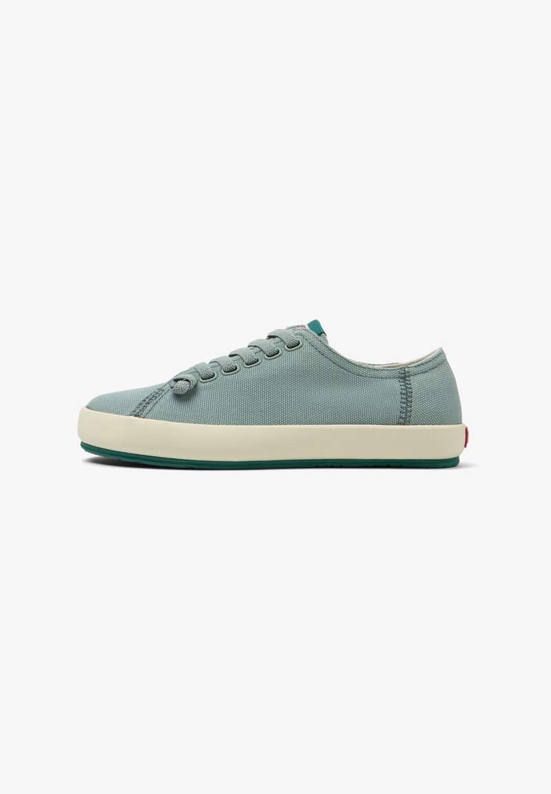 Light green canvas sneaker with round toe, cream rubber sole, and six eyelets. Minimalist design with contrasting mint accents.