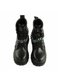 Black leather boots with textured finish, featuring a chunky outsole and decorative multicolored chain. High-top design with lace closure.
