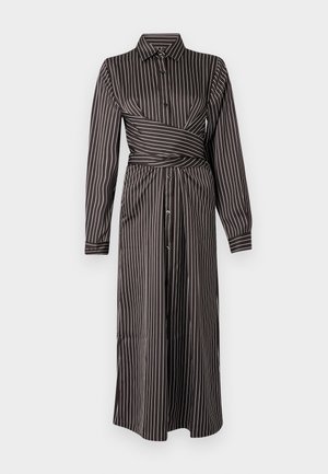 Mekko, jossa on musta-valkoiset raidat, kaulus, pitkät hihat, napitus edessä, vyötärönauha ja polvenpituinen helma. Sujuva kangas.