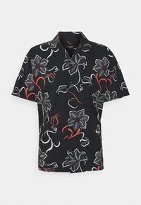 Short-sleeved black shirt featuring a floral pattern in white and red, characterized by a collar and button-down front.
