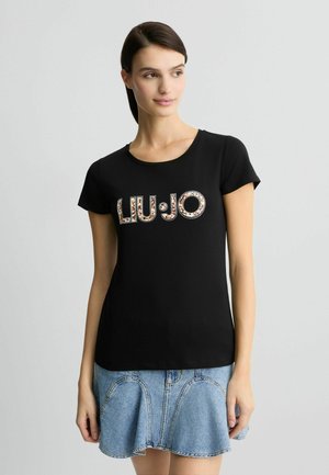 T-shirt nera a maniche corte con il logo "LIU•JO" in lettere decorative e colorate. Tessuto morbido con scollatura rotonda e design aderente.