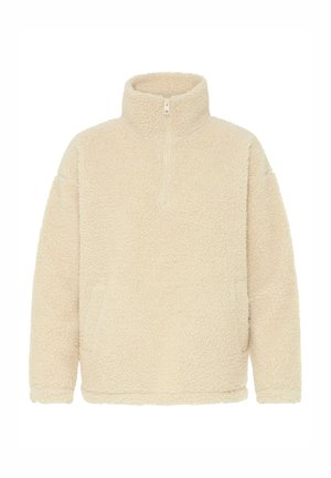 Polaire couleur crème à col montant avec une fermeture éclair au quart. Présente une surface douce et texturée ainsi qu'une coupe décontractée. Aucun dispositif de fixation visible.