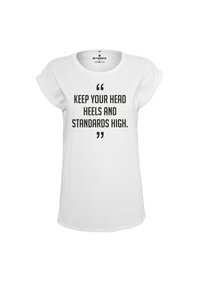 White short-sleeve t-shirt featuring bold black text: "KEEP YOUR HEAD HEELS AND STANDARDS HIGH." Classic crew neck design.