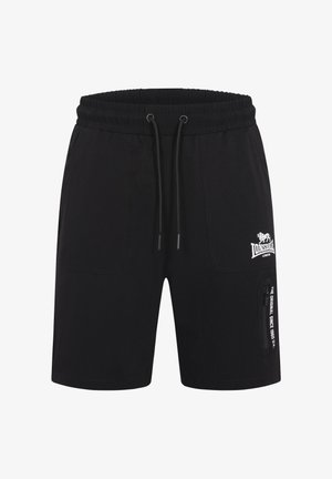 Pantalones cortos negros con cintura elástica, cierre de cordón, bolsillos laterales y un bolsillo con cremallera. Presenta un logo blanco en el muslo.