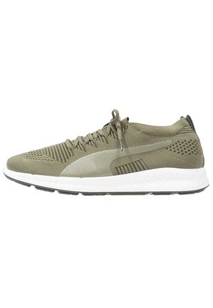 Olive green athletic shoes with a breathable knit upper, textured accents, a white midsole, and a black heel tab for stability.