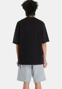 Calvin Klein Camiseta estampada - black