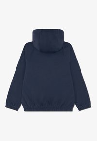 Lacoste Lahka jakna - marine