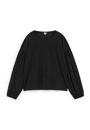 Black long-sleeve top made of cotton. Features a round neckline, loose fit, and gathered sleeves for added volume. Simple design, no patterns.