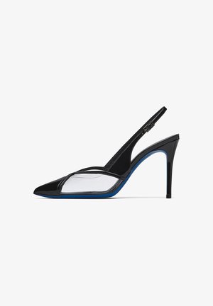 Black patent leather slingback high heel shoe with pointed toe, transparent side panels, and blue sole detailing.