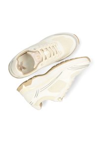 Beiga sportskor med ovandel i mesh, rund tå och gummisula. Har subtila designlinjer och texturerade sidodekor.