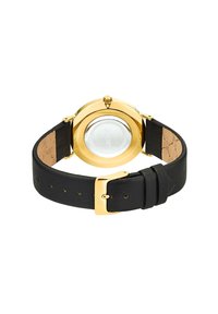 Runde Uhr mit einem Gehäuse in Goldfarbe, transparentem Glasboden und einem schwarzen Lederarmband mit strukturierter Oberfläche und Schnallenverschluss.