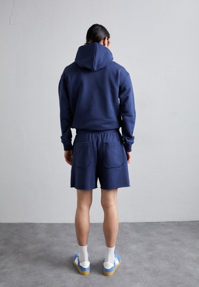 Helmut Lang EMBOSSED - Calções - indigo