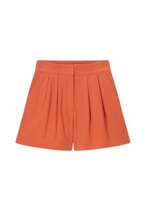 Short taille haute couleur rouille-orange avec plis sur le devant, poches latérales et taille lisse avec fermeture invisible.