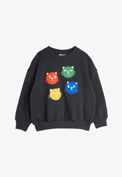 Sudadera negra con cuatro caras de gato coloridas en rojo, verde, amarillo y azul, con formas redondeadas y detalles bordados.