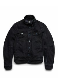 Musta denimtakki, jossa on korkea kaulus, kaksi rintataskua, nepparit ja siniset yksityiskohdat. Takissa on istuva leikkaus ja hienovaraiset ompeluasiat.