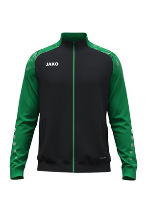 Černo-zelená sportovní bunda s celopropínacím zipem vpředu, vysokým límcem, logem "JAKO" na hrudi a zelenými rukávy s kruhovými vzory.