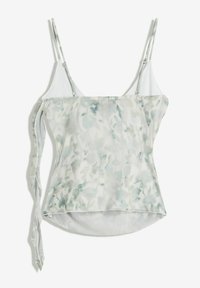 Camisola senza maniche con spalline sottili regolabili, motivo floreale azzurro e bianco, e un dettaglio con nodo laterale su sfondo bianco.