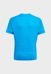 Kortärmad träningsskjorta i klarblå. Har en mönstrad textur och kontrasterande sidor. Tillverkad av lätt, andningsbart material.