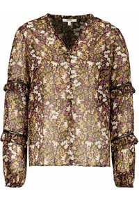 Czarna przezroczysta bluzka z kwiatowym wzorem w odcieniach purpury, bieli i żółci. Posiada dekolt w kształcie litery V, falbaniaste rękawy oraz subtelne czarne wykończenie na mankietach.