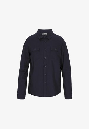 Cămașă de culoare bleumarin dintr-un amestec de bumbac, având guler, două buzunare pe piept, mâneci lungi și o croială dreaptă cu nasturi contrastanți.