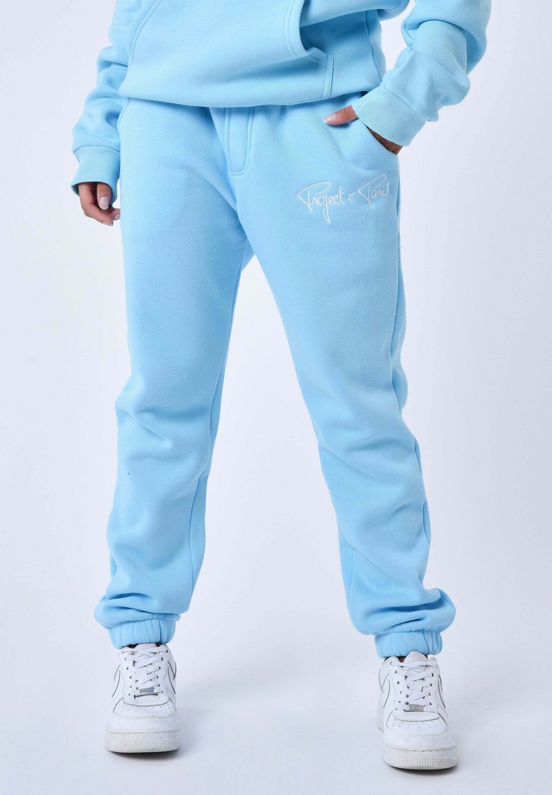 Project Tracksuit Project X Paris SIGNATURE - Tracksuit bottoms - bleu turquoise ...