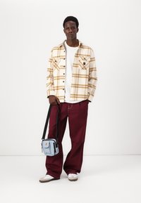 Brixton GLOBAL BAGGY PANT - Relaxed fit jeans - port